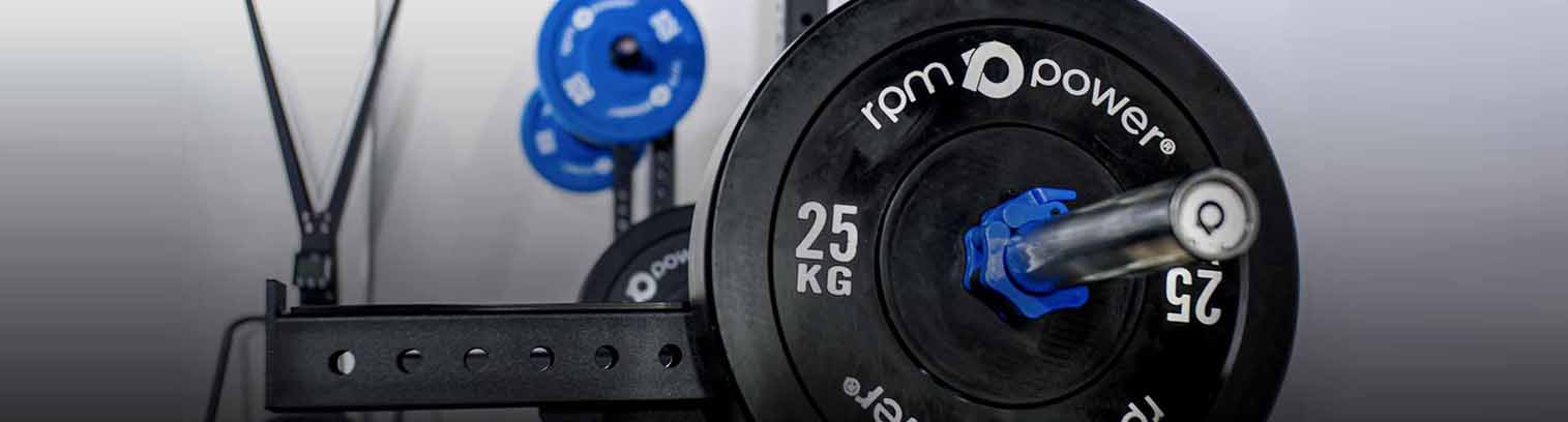 FAQ banner with adjustable squat rack and blue weight plates.
