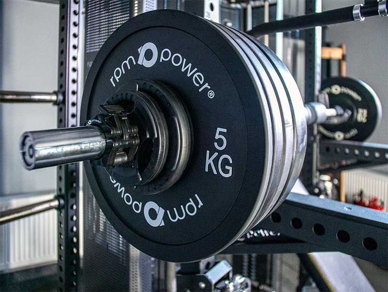 RPM Power 5kg weight plate set on barbell